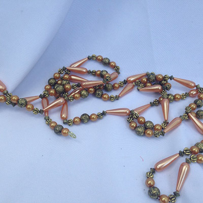 Mediterranean Peach Strand Beads - Event Rentals - Beautiful bead strands